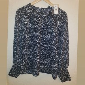 Blouse Size Medium Women with tones of white, blue, and black. Express Brand